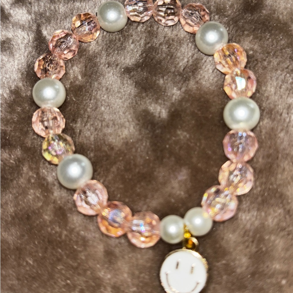 Elegant Pink and Pearl Bracelet with Smiley Charm